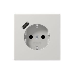 Enchufe Schuko con cargador USB tipo A en gris claro jung LS 990. Ref: LS1520-18ALG